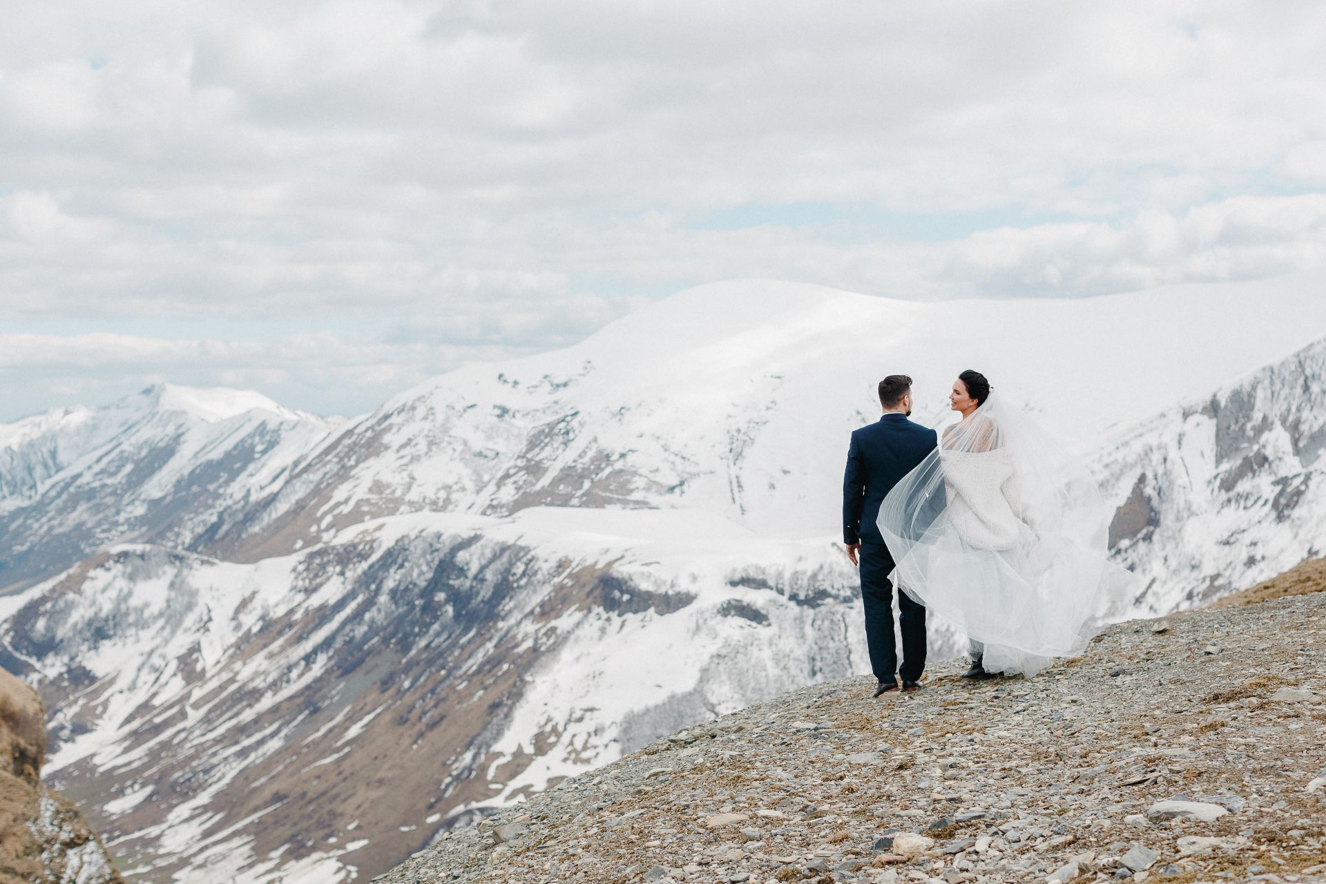 International couple mountain wedding planning